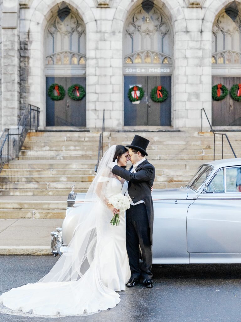 Winter Wedding in New England with a Rolls Royce in front of a Catholic Church